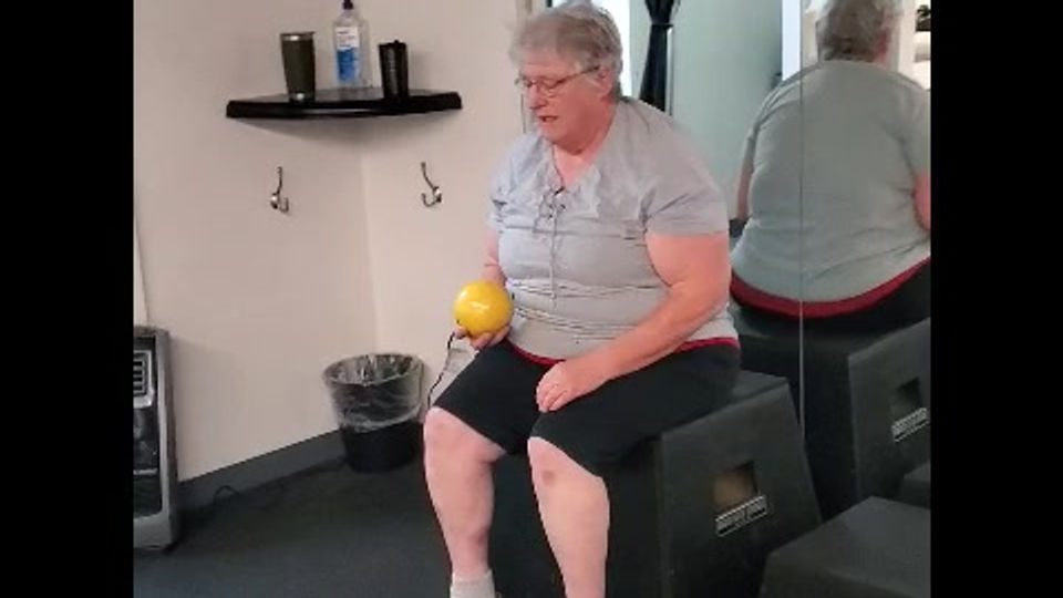 Sit and stand with single arm overhead press